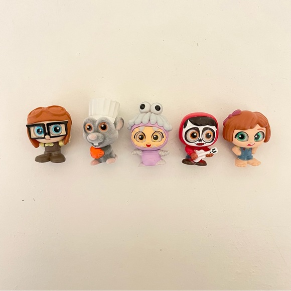 FREE w/purchase Pixar doorables | Young Carl & Ellie , Remy , Boo , Miguel - Picture 1 of 5